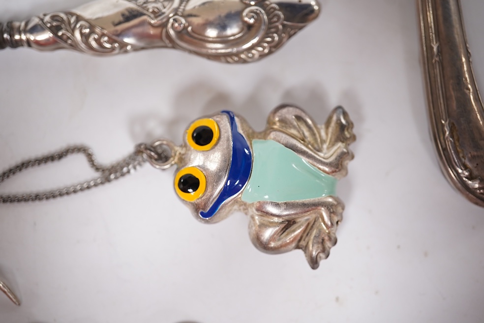 An early 1960's Georg Jensen sterling brooch, no. 339 (designed by Henning Koppel, 58mm, together with a small group of jewellery and other items including a pair of silver oval cufflinks, a Persian coin necklace, a 14ct